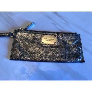 MICHAEL KORS metallic silver leather wristlet